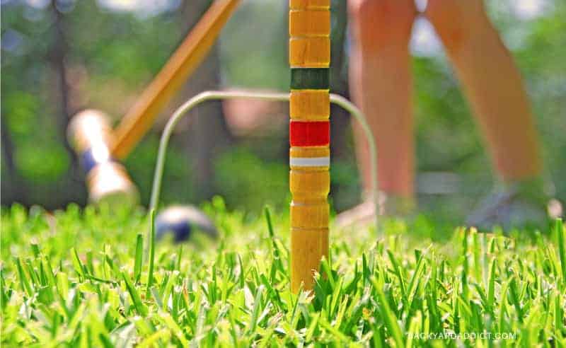 close up of someone playing croquet
