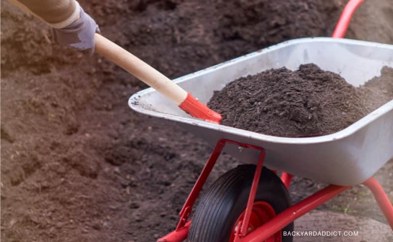 wheelbarrow full of soil