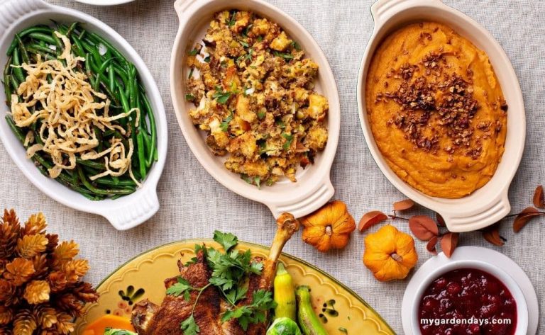 Thanksgiving sides next to a cooked Turkey