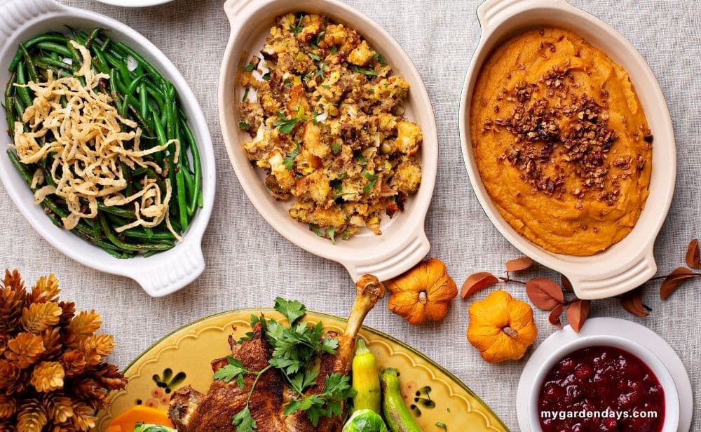 Thanksgiving sides next to a cooked Turkey
